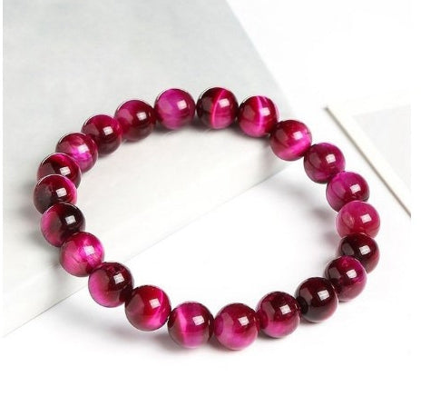 Bracciale con occhio di tigre rosa