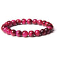 Bracciale con occhio di tigre rosa
