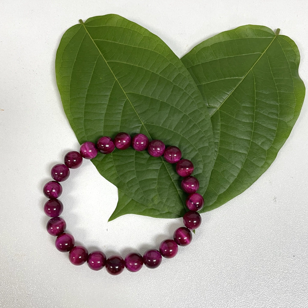 Bracciale con occhio di tigre rosa